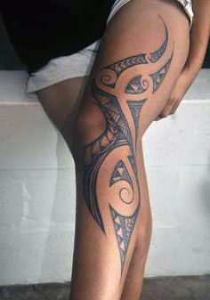 tatuaże damskie na nodze tribal 