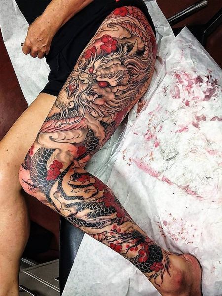 dragon thigh tattoo
